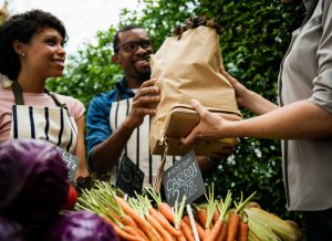 people buying organic vegetables